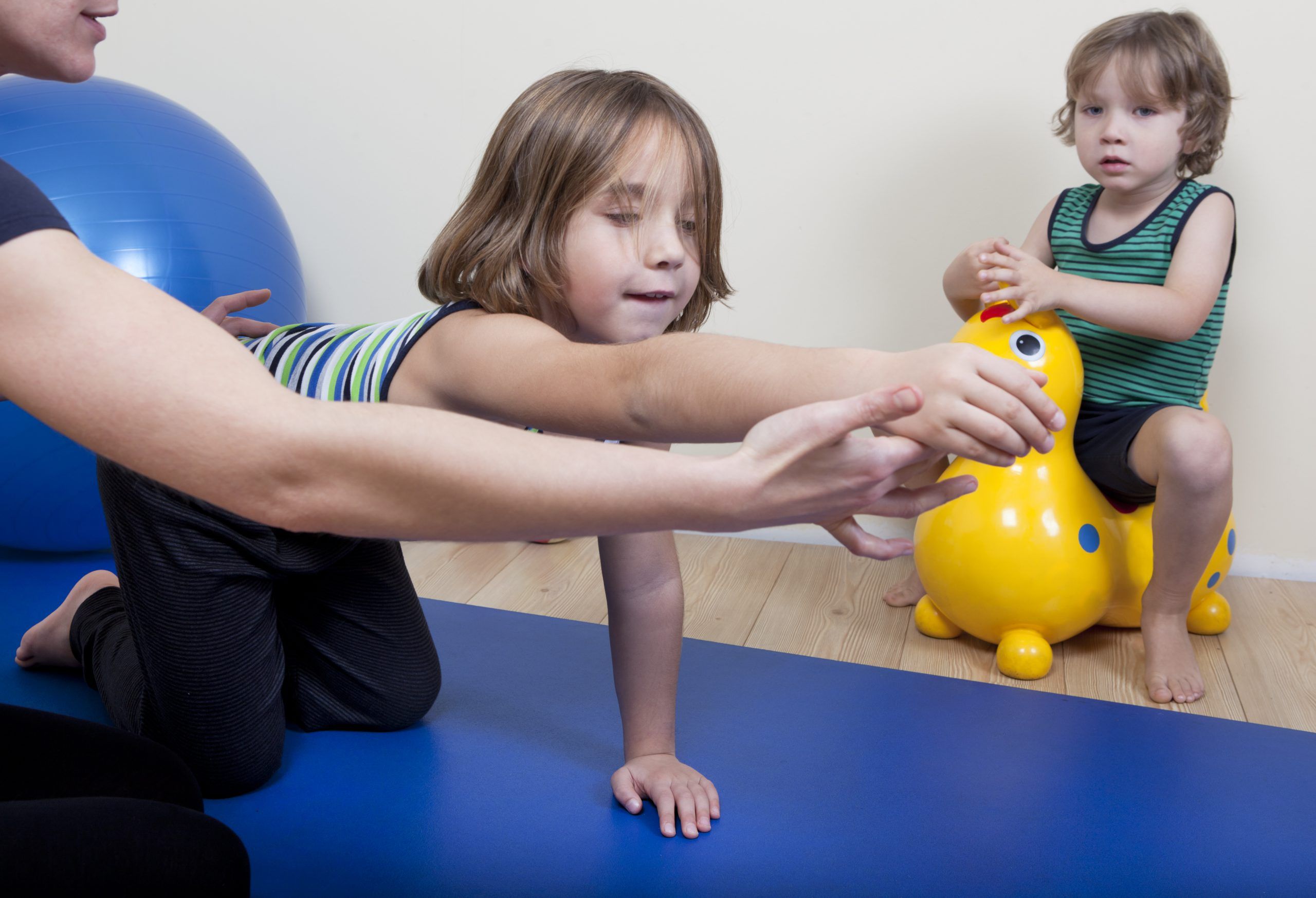 Physiotherapy with two children
