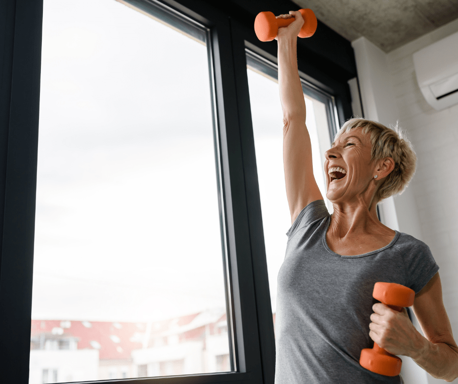 Senior woman exercising with dumbells