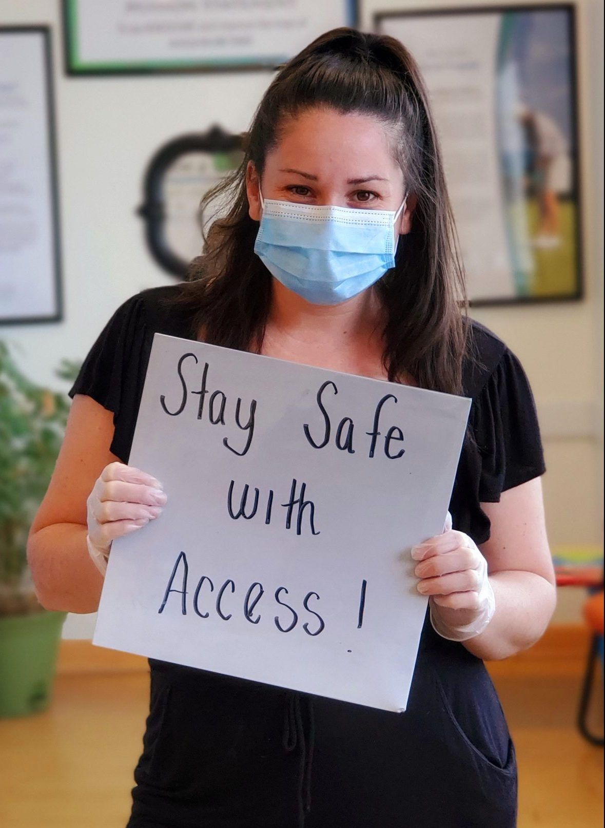 physical therapist wearing mask and gloves