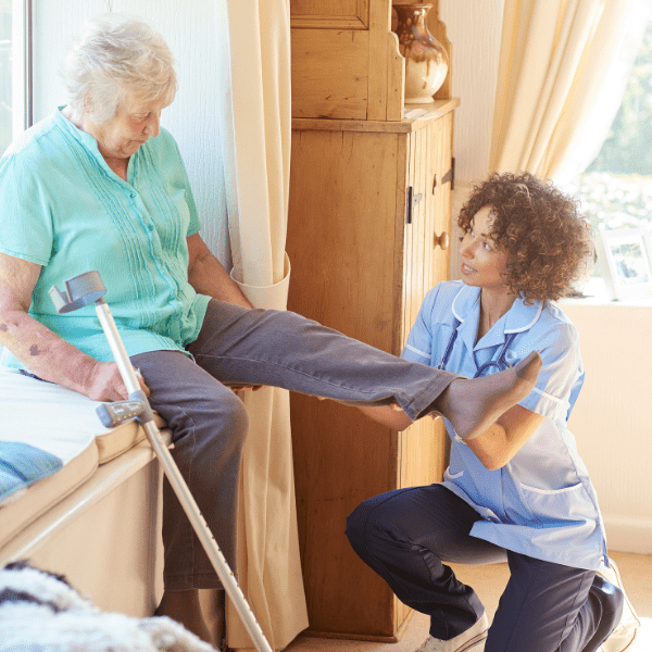 in-home physical therapist with patient