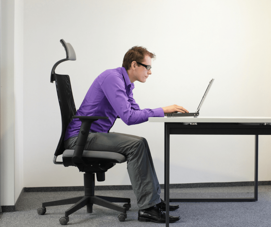 Man at computer with poor posture